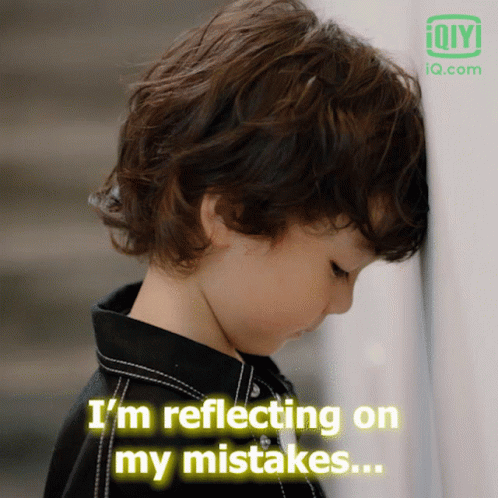 Boy Leaning Against Wall Reflecting On Mistakes GIF