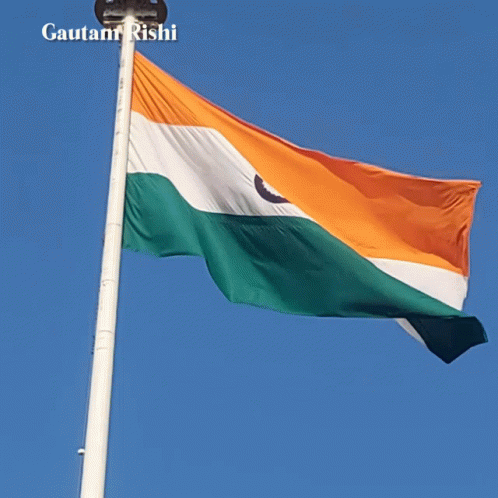A Young Boy Salutes In Front Of A Flag And The Name Gautam Rishi GIF
