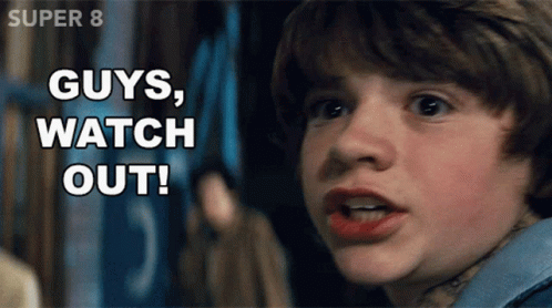 A Young Boy Says " Guys Watch Out " In Front Of A Super 8 Sign GIF