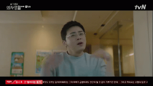A Young Boy Sits At A Table With Two Bowls Of Food And A Tvn Logo In The Corner GIF