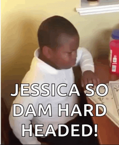 A Young Boy Sitting At A Desk With The Words Jessica So Dam Hard Headed Written Below Him GIF