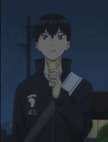 A Young Boy Wearing A Black Jacket With Ics On It GIF