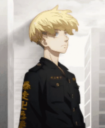 A Young Boy With Blonde Hair Is Wearing A Black Jacket With Chinese Writing On The Sleeves . GIF
