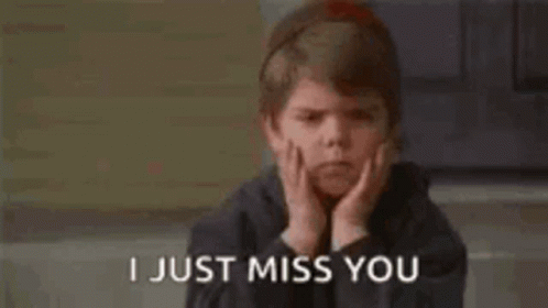 A Young Boy With His Hands On His Face And The Words `` I Just Miss You '' . GIF