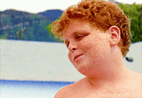 Red Haired Boy With Freckles By Pool GIF