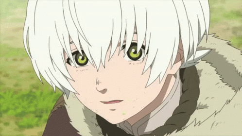 A Young Boy With White Hair And Green Eyes GIF