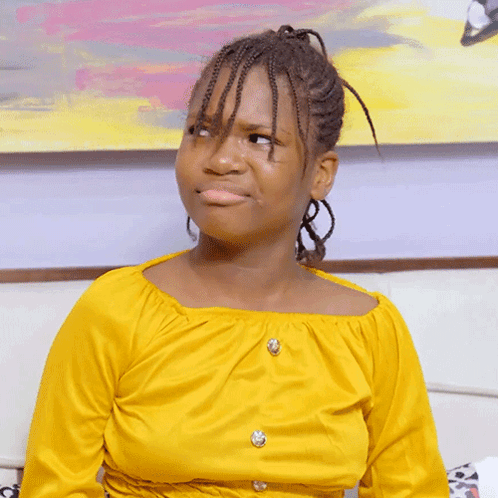 Girl In Yellow Top Making Funny Face GIF