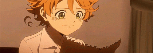 A Young Girl Is Holding A Piece Of Paper In Her Hand And Looking At It . GIF