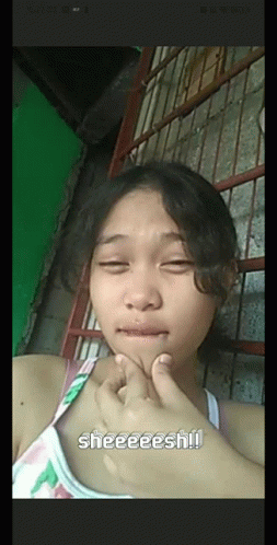 a young girl is making a funny face with the words sheeeesh written on the bottom
