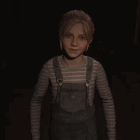 A Young Girl With Blonde Hair And Freckles Is Looking At The Camera In A Dark Room . GIF