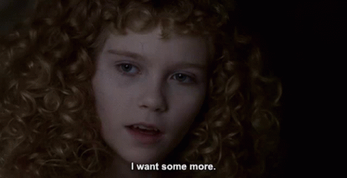A Young Girl With Curly Hair Says I Want Some More GIF
