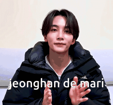 A Young Man In A Black Jacket With The Words Jeonghan De Mari GIF