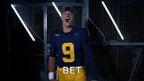 A Young Man In A Blue Jersey Is Smiling And Holding His Hands To His Chest . GIF