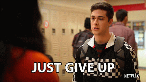 A Young Man In A Checkered Jacket Says " Just Give Up " GIF