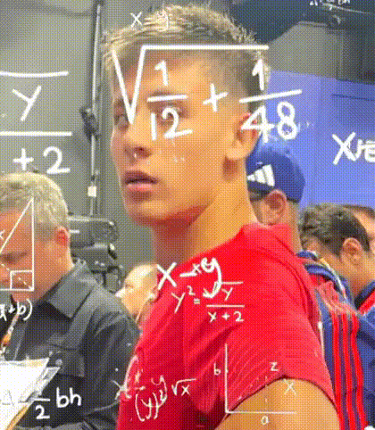 A Young Man In A Red Shirt Is Standing In Front Of A Blackboard With Mathematical Equations Written On It . GIF