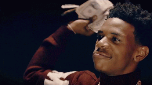 A Young Man In A Red Sweater With The Letter F On The Sleeve GIF