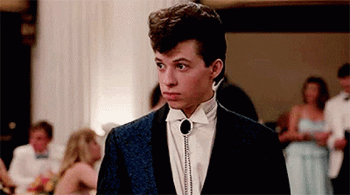 Young Man In Tuxedo At Party GIF