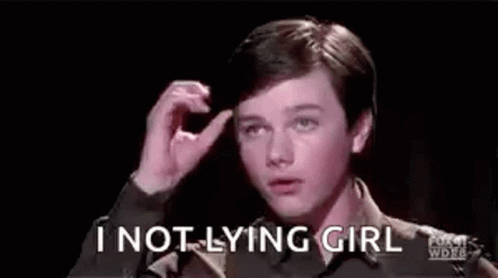 A Young Man Is Holding His Hair In His Hand And Says `` I Not Lying Girl '' . GIF