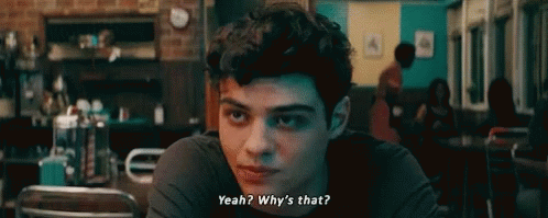 A Young Man Is Sitting At A Table In A Diner And Asking Why 'S That ? GIF