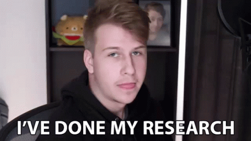 A Young Man Is Sitting In Front Of A Camera And Says `` I 'Ve Done My Research '' GIF