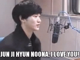 A Young Man Is Sitting In Front Of A Microphone And Saying `` Jun Ji Hyun Noona , I Love You '' . GIF