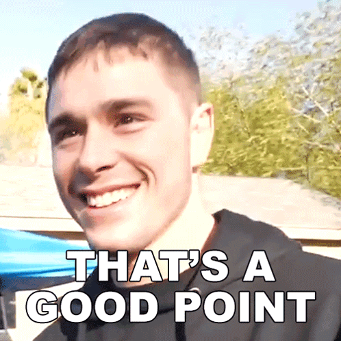 A Young Man Is Smiling With The Caption That 'S A Good Point GIF