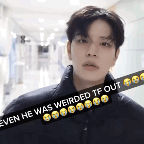 A Young Man Is Standing In A Hallway With A Caption That Says " Even He Was Weirded Tf Out " GIF