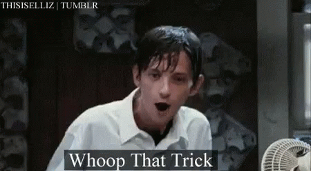 A Young Man Is Standing In Front Of A Fan With His Mouth Open And Says `` Whoop That Trick '' . GIF