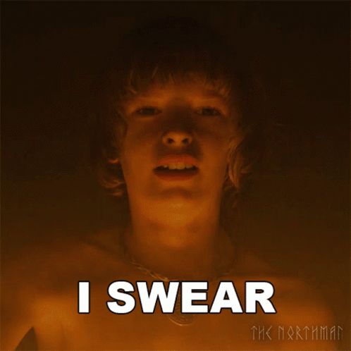 a young man says i swear in front of a dark background