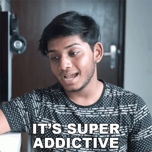 A Young Man Says It 'S Super Addictive While Wearing A Black Shirt GIF