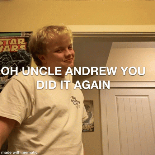 a young man stands in front of a star wars poster and says " oh uncle andrew you did it again "