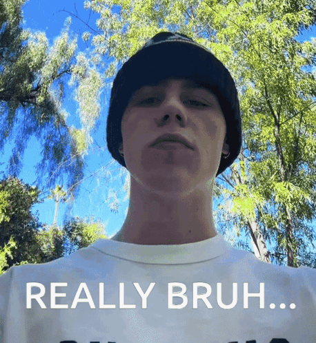 A Young Man Wearing A Beanie And A White Shirt Says Really Bruh ... GIF