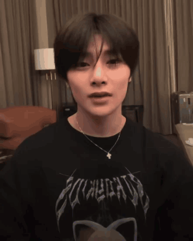 A Young Man Wearing A Black Shirt That Says Eclectic GIF