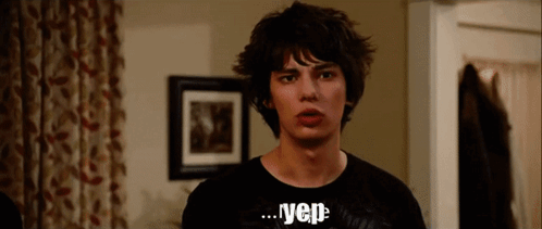 A Young Man Wearing A Black T-Shirt That Says Vep GIF