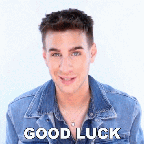 A Young Man Wearing A Denim Jacket Says Good Luck GIF
