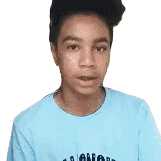 a young man wearing a light blue t-shirt with the word one on it looks at the camera