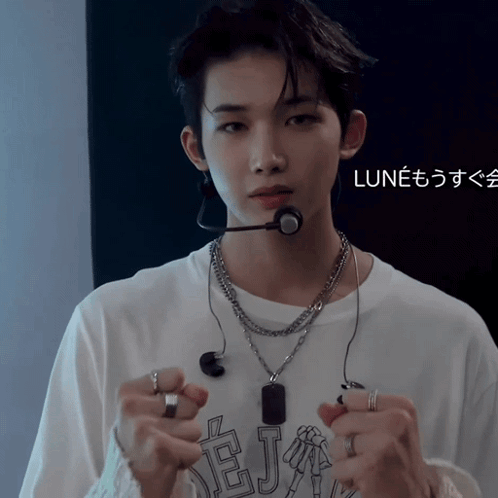 Young Man With Necklace And Microphone Lune GIF