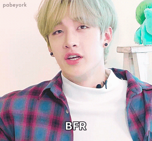 Young Man In Plaid Shirt With BFR Text GIF