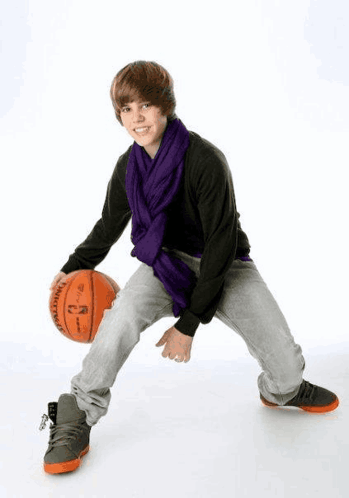 Young Man With Purple Scarf Holding Basketball GIF
