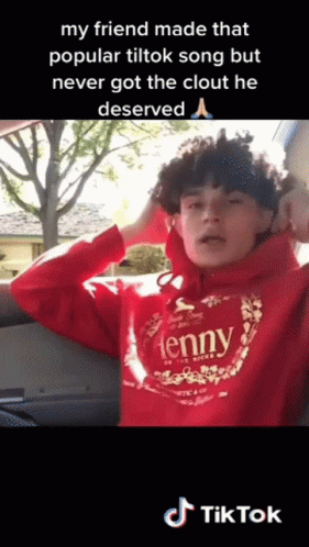 A Young Man Wearing A Red Hoodie That Says Jenny On It GIF