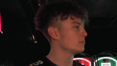 A Young Man Wearing A Shirt That Says Tus GIF