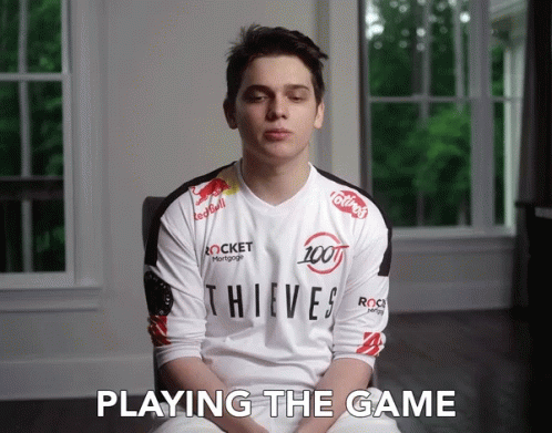 A Young Man Wearing A Thieves Jersey Is Sitting In A Chair GIF