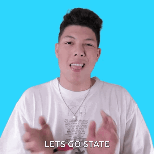 A Young Man Wearing A White Shirt That Says Lets Go State GIF