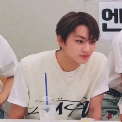 A Young Man Wearing A White Vest And A White T-Shirt With The Number 19 On It GIF