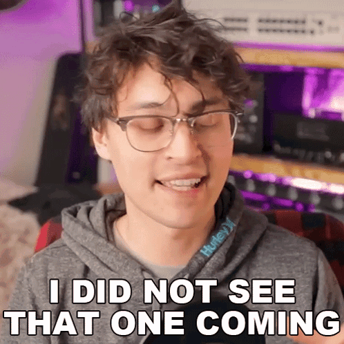 A Young Man Wearing Glasses And A Hurley Sweatshirt Says I Did Not See That One Coming GIF