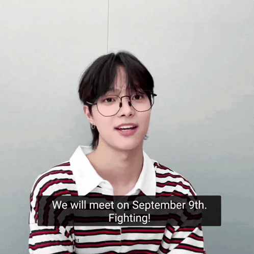 A Young Man Wearing Glasses And A Striped Shirt Says " We Will Meet On September 9Th Fighting " GIF