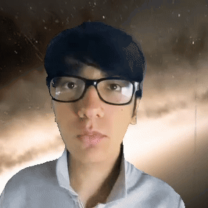 A Young Man Wearing Glasses And A White Shirt GIF