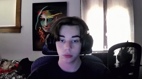 Young Man With Headphones And Painting GIF