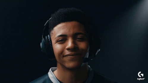A Young Man Wearing Headphones With A Logitech Logo In The Corner GIF