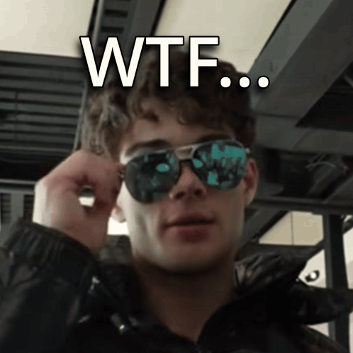 A Young Man Wearing Sunglasses Has The Words Wtf Written On His Face GIF